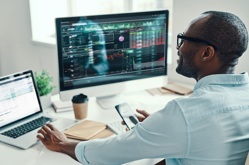 A man is checking stock market